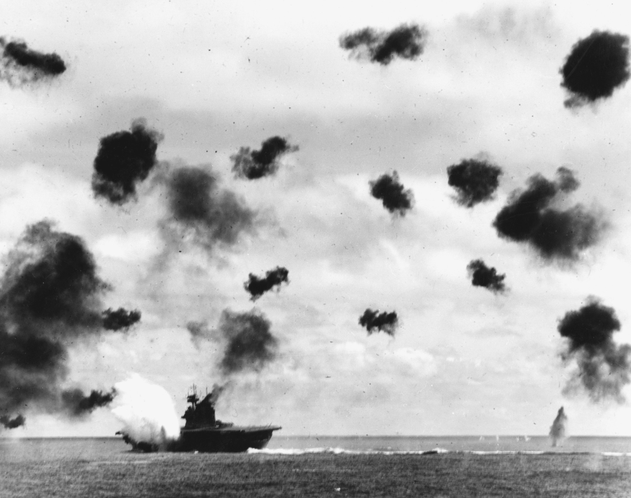 USS Yorktown hit by a Japanese aerial torpedo during the Battle of Midway, 4 June 1942 USS Yorktown hit by a Japanese aerial torpedo during the Battle of Midway, 4 June 1942 